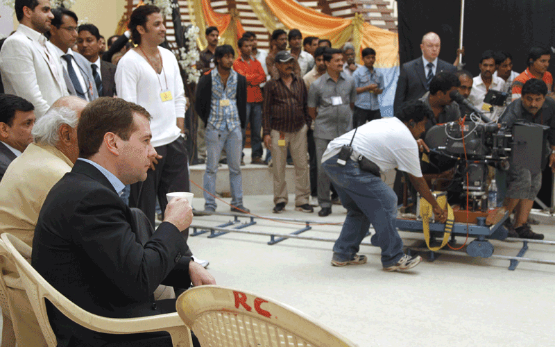 Russia's President Dmitry Medvedev (L) visits a Bollywood studio in Mumbai.  (REUTERS)