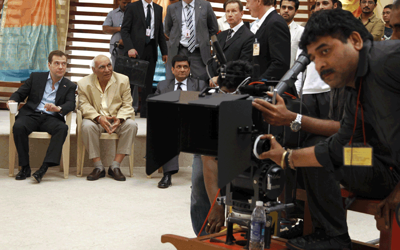 Russia's President Dmitry Medvedev (L) visits a Bollywood studio in Mumbai.  (REUTERS)