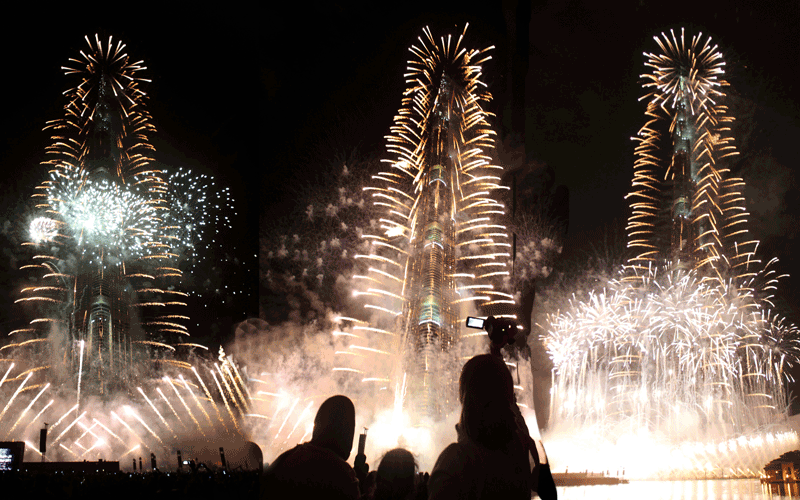 Fireworks explode over Burj Khalifa, the tallest building in the world, celebrating the new year in Dubai. (REUTERS)