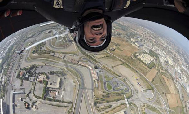 Spanish MotoGP rider Dani Pedrosa takes a flight over the Circuit de Catalunya F1 track in Barcelona. (REUTERS)