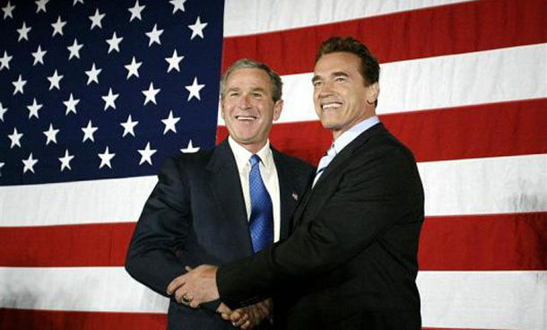 President George W. Bush greets California governor-elect Arnold Schwarzenegger at an event in Riverside, California. (REUTERS)