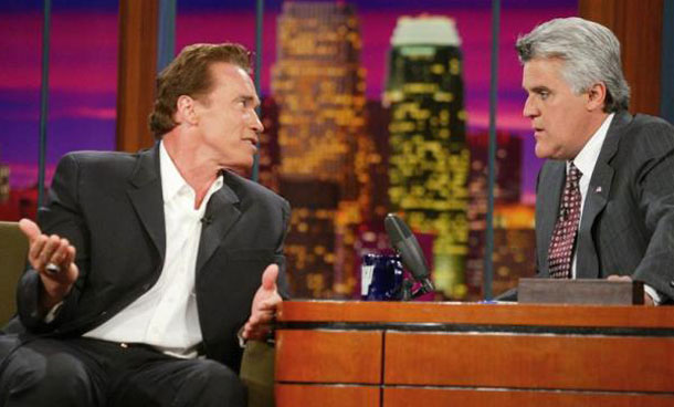 Actor Arnold Schwarzenegger discusses his plans for his campaign with host Jay Leno after he announced that he will be a candidate for governor of California in the recall election, during his ppearance on "The Tonight Show with Jay Leno" at the NBC studios in Burbank, California. (REUTERS)