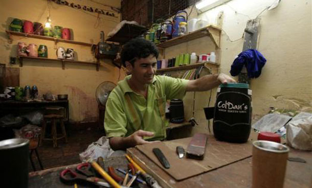 An inmate makes crafts for sale inside the Tacumbu high security prison in Asuncion. (REUTERS)