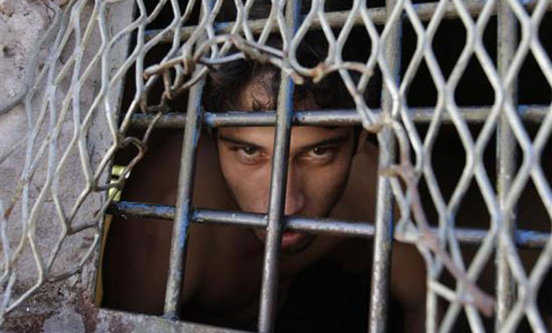 An inmate stands inside the Alcatraz wing, housing the most dangerous prisoners of the Tacumbu high security prison in Asuncion. (REUTERS)