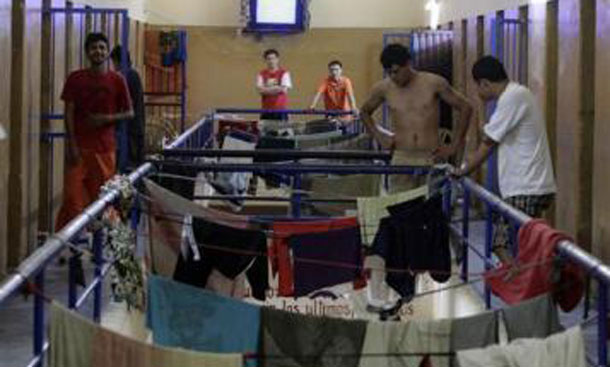 Inmates dry their laundry inside the Tacumbu high security prison in Asuncion. (REUTERS)