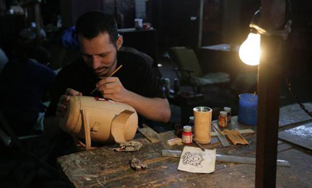 An inmate makes crafts for sale inside the Tacumbu high security prison in Asuncion. (REUTERS)