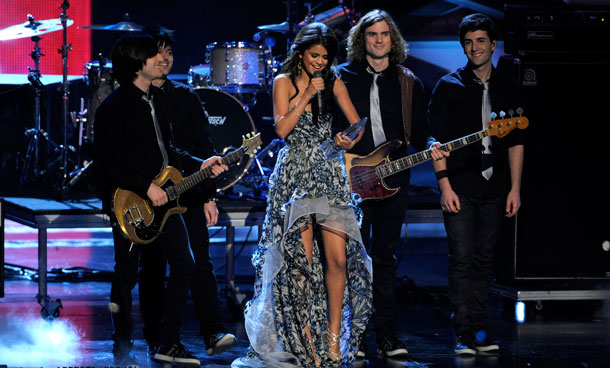 Selena Gomez and The Scene accept favorite breakout artist at at the People's Choice Awards in Los Angeles. (AP)