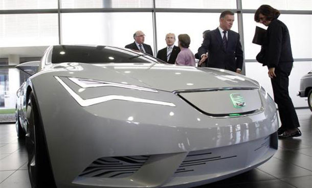 James Muir, CEO of Spanish car manufacturer Seat, speaks next to a Seat IBE concept car during a visit to the future Audi Q3 factory in Martorell, near Barcelona. (REUTERS)