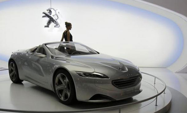 The Peugeot SR1 Concept car is displayed at the Moscow Auto Salon 2010 the Moscow International Motor Show. (REUTERS)