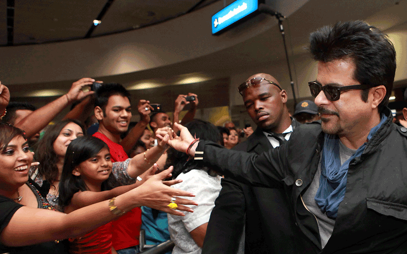 Bollywood actor and producer Anil Kapoor arrives at the Durban King Shaka International airport. Kapoor will compere at a Bollywood show to be performed after the Standard Bank International Pro 20 friendly cricket match between India and South Africa to be played on January 9, 2011 at the Moses Mabhida 2010 FIFA soccer stadium. Other top stars such as Shah Rukh Khan, Priyanka Chopra, Shaheed Kapoor, Malaika Arora Khan and others are set to perform to almost 50 000 fans.This is the first time that a crowd of 50 000 spectators will watch a cricket match in the African continent. (AFP)