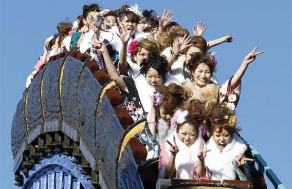 Japanese women in kimonos ride a roller-coaster during their Coming of Age Day event at an amusement park in Tokyo. The Coming of Age day is held annually on the second Monday of January to congratulate all those who have reached the age of 20 years old. According to a local report, about 1,240,000 men and women who were born in 1990, reached the coming of age this year and this figure is the smallest number since 1968 in the world's oldest major country. (REUTERS)