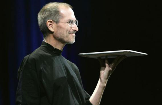 Steve Jobs holds Apple's new Macbook Air notebook computer as he delivers his keynote address during the Macworld Convention and Expo in San Francisco January 15, 2008. (REUTERS)