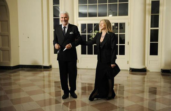 Barbra Streisand and her husband James Brolin arrive for the state dinner hosted by President Obama and first lady Michelle for President of China Hu Jintao at the White House. (REUTERS)