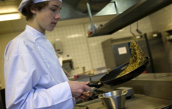 Max Kipp, a student at the Rijn IJssel school for chefs, stir-fries mealworms with spring onions to be used in a quiche in Wageningen January 12, 2011. All you need to do to save the rainforest, improve your diet, better your health, cut global carbon emissions and slash your food budget is eat bugs. Mealworm quiche, grasshopper springrolls and cuisine made from other creepy crawlies is the answer to the global food crisis, shrinking land and water resources and climate-changing carbon emissions, Dutch scientist Arnold van Huis says. To attract more insect-eaters, Van Huis and his team of scientists at Wageningen have worked with a local cooking school to produce a cookbook and suitable recipes. (REUTERS)