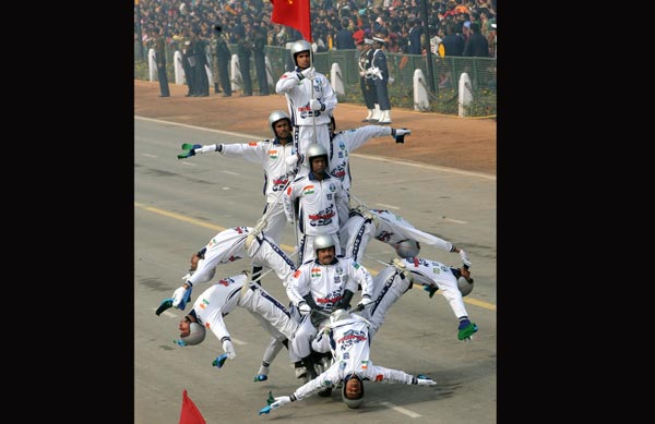 Indian Border Security Force (BSF) soldiers perform motorcycle stunts during the final full dress rehearsal for the Indian Republic Day parade in New Delhi. (AFP)