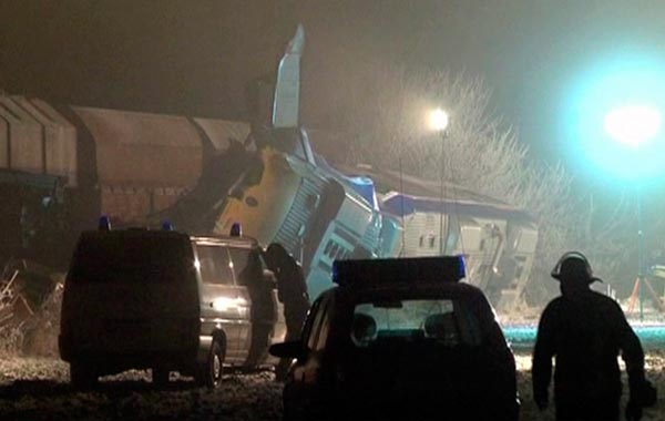 Rescue workers arrive on site after a train collision in Saxony-Anhalt in this video frame grab taken. (REUTERS)