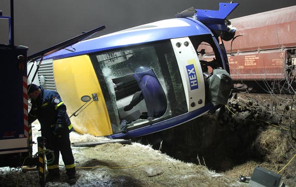 A regional passenger train lies on the side after it collided with a goods train. (AFP)