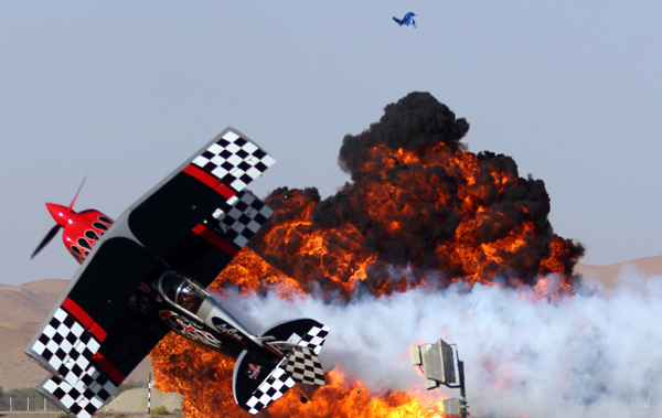 The Skip Stewart Team of the US perform during the Al-Ain International Aerobatics Show at the Gulf emirate's airport. (AFP)