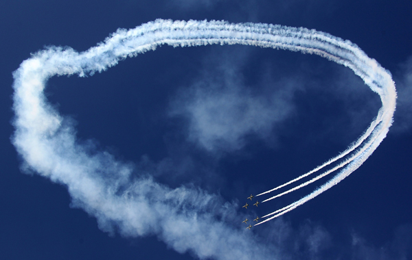 The Royal Saudi Hawks, the aerobatic team of the Royal Saudi Air Force, perform during the Al-Ain International Aerobatics Show at the Gulf emirate's airport. (AFP)