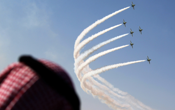 The Royal Saudi Hawks, the aerobatic team of the Royal Saudi Air Force, perform during the Al-Ain International Aerobatics Show at the Gulf emirate's airport. (AFP)