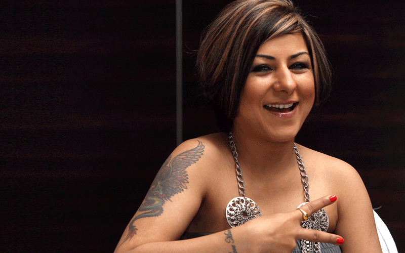 Indian Cinestar and playback singer Hard Kaur seen during a press conference before the release of their new movie Patiala House in Dubai. (Photo by Ashok Verma)