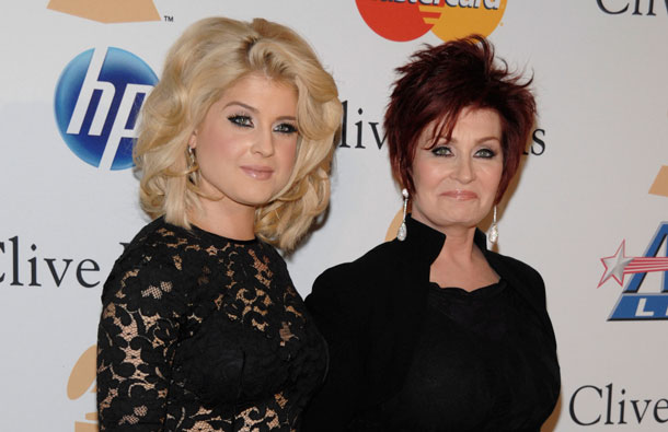 Kelly Osbourne, left, and Sharon Osbourne arrive at the Pre-Grammy Gala & Salute to Industry Icons with Clive Davis honoring David Geffen in Beverly Hills, Calif. (AP)