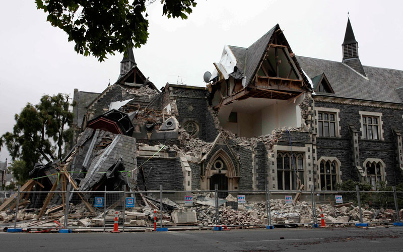 A building in Christchurch, New Zealand, is destroyed after an earthquake struck Tuesday, Feb. 22, 2011. The 6.3-magnitude quake collapsed buildings and is sending rescuers scrambling to help trapped people amid reports of multiple deaths. (AP)