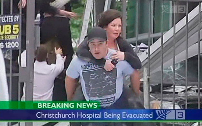 In this image made from video run by New Zealand's TV3, a woman is carried off a collapsed building in Christchurch, New Zealand Tuesday, Feb. 22, 2011 after a 6.3-magnitude earthquake rocked the city. (AP)