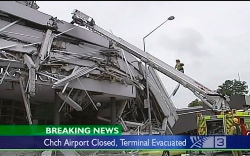 In this image made from video run by New Zealand's TV3, a rescuer makes a rescue operation for a woman trapped on roof of damaged building in Christchurch, New Zealand Tuesday, Feb. 22, 2011 after a 6.3-magnitude earthquake rocked the city. (AP)