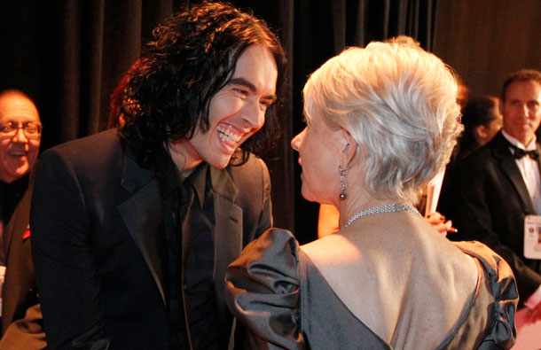 Russell Brand, left, and Helen Mirren are seen backstage at the 83rd Academy Awards on Sunday, in the Hollywood section of Los Angeles. (AP)