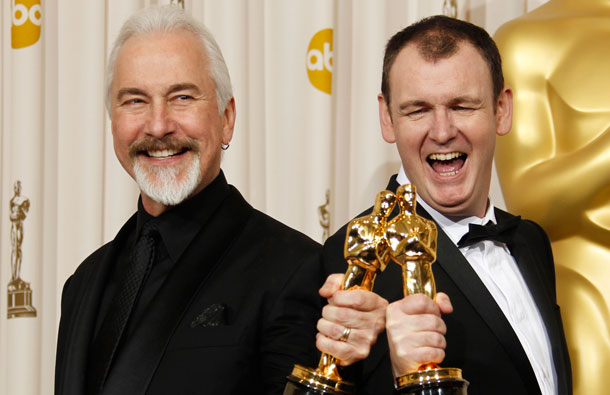 Rick Baker, left, and Dave Elsey pose backstage with the Oscar for best makeup for "The Wolfman" at the 83rd Academy Awards on Sunday, in the Hollywood section of Los Angeles. (AP)