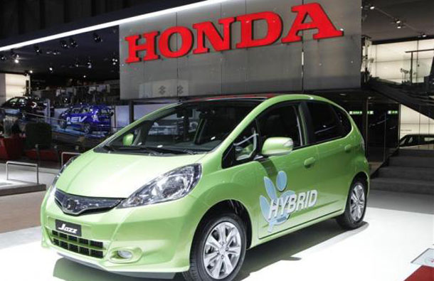 A new Honda Jazz hybrid car is displayed during the first media day of the 81st Geneva Car Show at the Palexpo in Geneva March 1, 2011. (REUTERS)