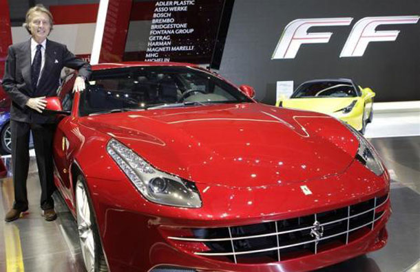 Ferrari CEO Luca Cordero di Montezemolo poses next to the new Ferrari FF car during the first media day of the 81st Geneva Car Show at the Palexpo in Geneva March 1, 2011. (REUTERS)