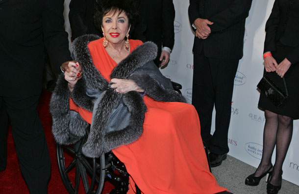 In this Dec. 1, 2007 file photo, Elizabeth Taylor arrives at Paramount Studios in the Hollywood section of Los Angeles to give a benefit performance of A.R. Gurney's play "Love Letters" for the Elizabeth Taylor HIV/AIDS Foundation. Publicist Sally Morrison says the actress died Wednesday, March 23, 2011 in Los Angeles of congestive heart failure at age 79. (AP)