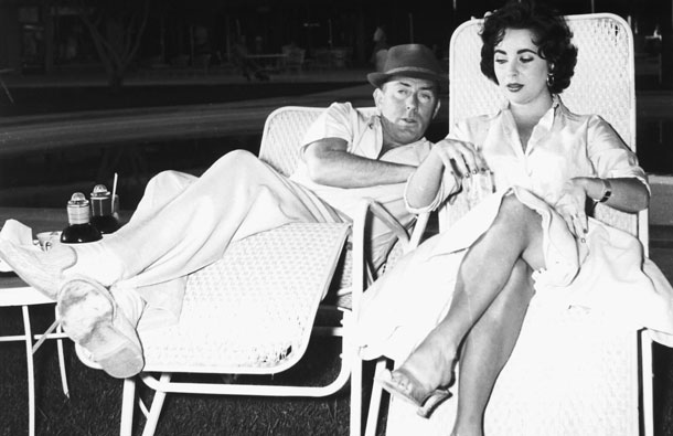 Actress Elizabeth Taylor and husband Michael Wilding are shown at the Sahara Hotel in Las Vegas in this March 7, 1956 publicity photo from the Las Vegas News Bureau released to Reuters March 23, 2011. Taylor, a two-time Oscar winner and Hollywood beauty whose screen success was sometimes overshadowed by her tumultuous personal life, died of congestive heart failure on Wednesday at age 79. (REUTERS)