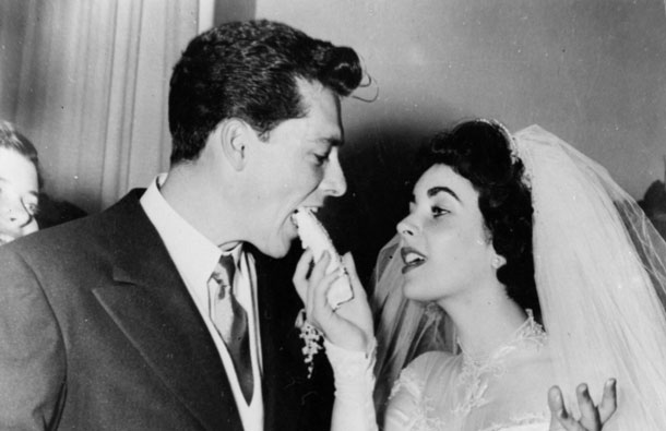 US film star Elizabeth Taylor and her first husband Nick Hilton, of the hotelier family, on their wedding day. (GALLO/GETTY)