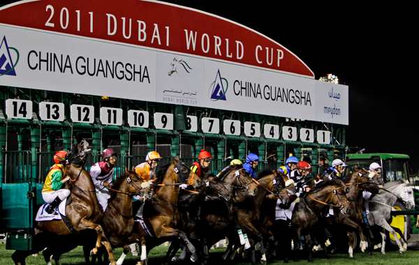 Race horses start the US$ 5 million  Dubai Sheema Classic race at the Meydan in Dubai, United Arab Emirates. (AP)