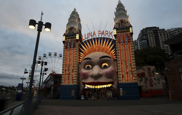 The Luna Park entrance is seen before the lights are switched off for Earth Hour in Sydney, Australia. (GETTY)