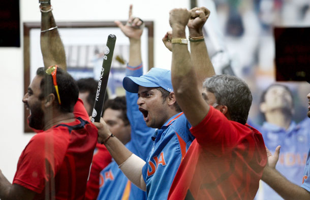 Suresh Raina  of India celebrates in the dressing rooms after the defeat of Pakistan  during the 2011 ICC World Cup second Semi-Final between Pakistan and India at Punjab Cricket Association (PCA) Stadium on March 30, 2011 in Mohali, India. (GETTY/GALLO)