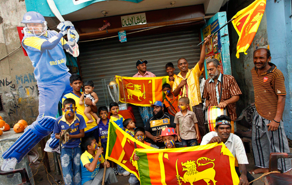 Sri Lankan cricket fans dance on the streets to cheer their team in Colombo, Sri Lanka, Saturday, April 2, 2011. Sri Lanka will play the Cricket World Cup final match against India. (AP)