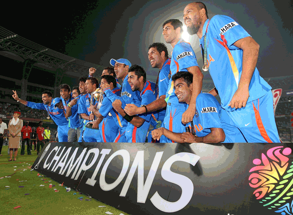 The Indian team celebrate with the trophy after the ICC World Cup final against Sri Lanka at Wankhede Stadium on Saturday in Mumbai, India. (GETTY)