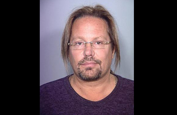 Singer Vince Neil of Motley Crue is shown in this booking photo from the Las Vegas Metropolitan Police Department released to Reuters February 15, 2011. (REUTERS)