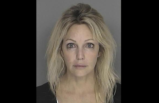 Actress Heather Locklear is shown in this booking mug released by Santa Barbara County Sheriff's Department. on September 28, 2008. (REUTERS)