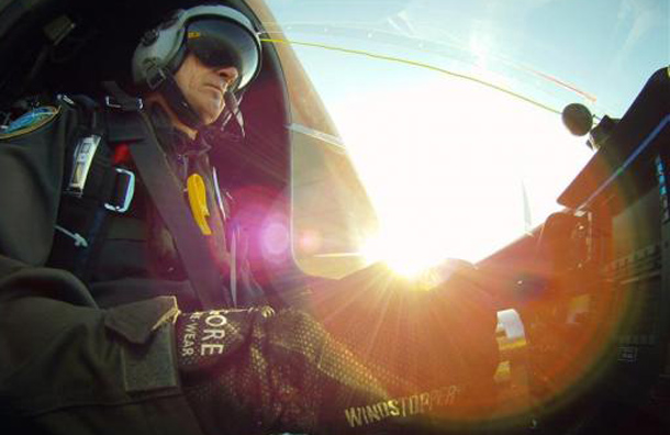 Solar Impulse's Chief Executive Officer and pilot Andre Borschberg steers the solar-powered HB-SIA prototype during a test flight at Payerne airport. (REUTERS)