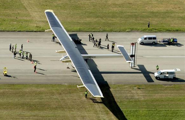 Solar Impulse's solar-powered HB-SIA prototype airplane stands still after its first successful night flight attempt at Payerne airport. (REUTERS)