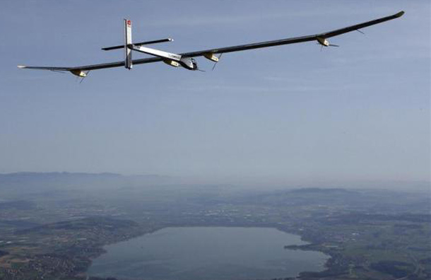 German test pilot Markus Scherdel steers the solar-powered Solar Impulse HB-SIA prototype airplane during his first flight over Payerne. (REUTERS)