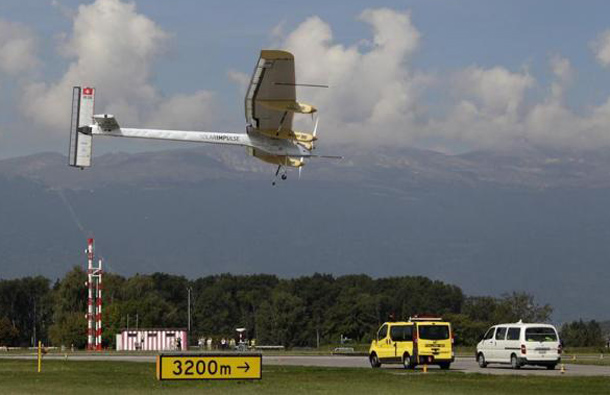 Solar Impulse's Chief Executive Officer and pilot Andre Borschberg lands the solar-powered HB-SIA prototype at Cointrin International airport in Geneva, September 21, 2010. The plane landed for the first time at a commercial airport, causing air traffic to he halted for 20 minutes to avoid turbulence. (REUTERS)