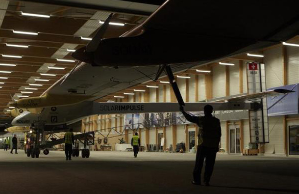 Solar Impulse's solar-powered HB-SIA prototype airplane is being prepared for a test flight at Payerne airport. (REUTERS)