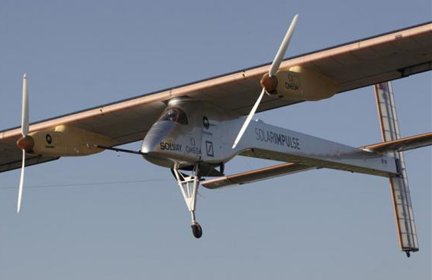 Solar Impulse's Chief Executive Officer and pilot Andre Borschberg performs a low altitude go-round procedure with the solar-powered HB-SIA prototype aircraft during a test flight at Payerne airport. (REUTERS)