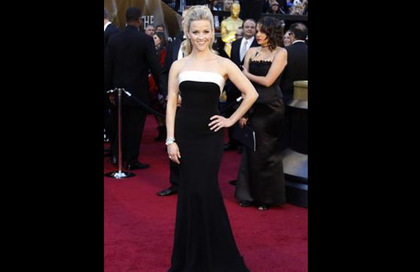 Actress Reese Witherspoon, wearing a gown by Armani Prive, arrives at the 83rd Academy Awards in Hollywood, California, February 27, 2011. (REUTERS)